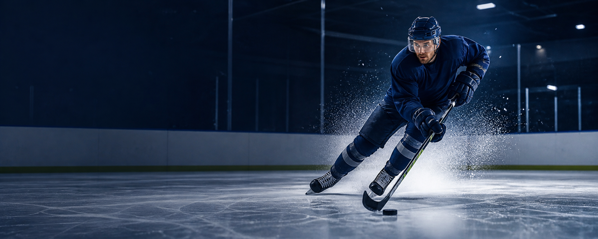 Hockey player accelerating with the puck during an on-ice training session